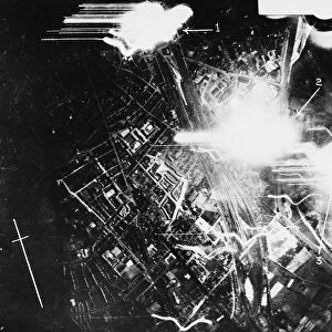 A night photograph taken from a RAF bomber while making a heavy attack upon Munster. 1