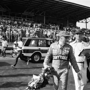 Niki Lauda, driving a Marlboro-McLaren, wins the British Grand Prix at Brands Hatch Niki Lauda, driving a Marlboro-McLaren, wins the British Grand Prix at Brands Hatch
