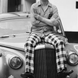 Eric Bristow Sitting on a Rolls Royce Print, 1977
