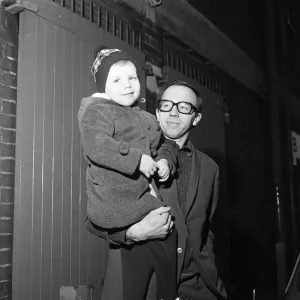 Nobby Stiles, the Manchester United half back leaves Old Trafford with his 3-year-old son Nobby Stiles, the Manchester United half back leaves Old Trafford with his 3-year-old son