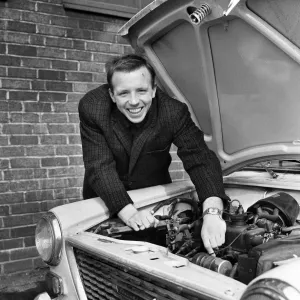 Nobby Stiles Manchester United player seen here tinkering with the engine of his car 8th Nobby Stiles Manchester United player seen here tinkering with the engine of his car 8th
