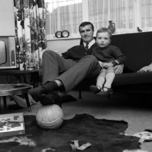 Noel Cantwell of Manchester United at home with son Robert Cantwell