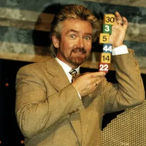 Noel Edmonds Tv Presenter with some National Lottery numbers Noel Edmonds Tv Presenter with some National Lottery numbers