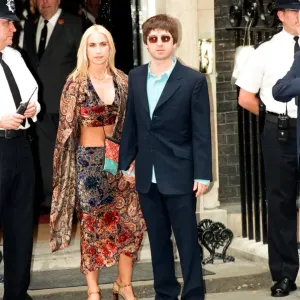 Noel Gallagher and his girlfriend Meg Matthews at 10 Downing Street for a party held by