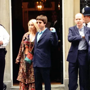 Noel Gallagher and his girlfriend Meg Matthews at 10 Downing Street for a party held by