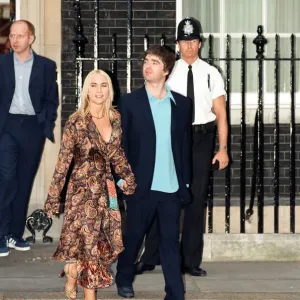 Noel Gallagher and his girlfriend Meg Matthews at 10 Downing Street for a party held by