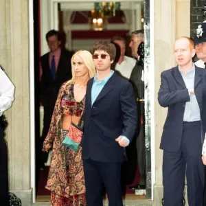 Noel Gallagher and his girlfriend Meg Matthews at 10 Downing Street for a party held by