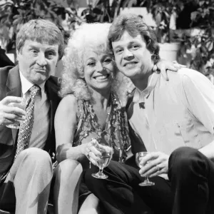 Norman Collier with Barbara Windsor and her boyfriend Stephen Hollings filming a TV show