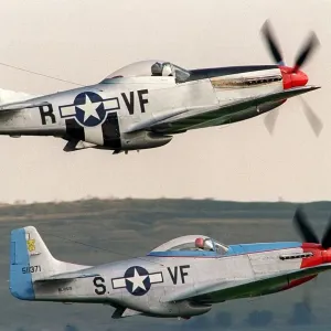 North American Mustangs flying in formation at the Wroughton Airshow in 1993 North American Mustangs flying in formation at the Wroughton Airshow in 1993