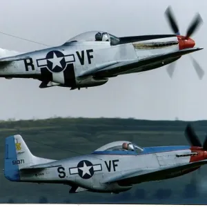North American P51D Mustang fighters in flight at the Wroughton Air Show North American P51D Mustang fighters in flight at the Wroughton Air Show