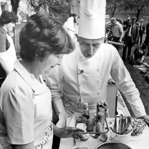 North East Festivals A cook takes some tips from a chef in the cook-o-ton in Old North East Festivals A cook takes some tips from a chef in the cook-o-ton in Old