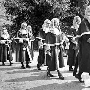 North judges walk in procession across Palace Green wearing their wigs