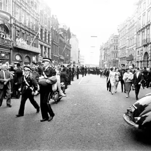 Northern Premier of A Hard Days Night'. Fans line up along the streets in Northern Premier of A Hard Days Night'. Fans line up along the streets in