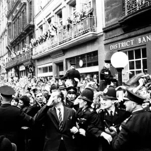 Northern Premier of A Hard Days Night'. Fans line up along the streets in Northern Premier of A Hard Days Night'. Fans line up along the streets in