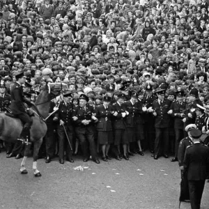 Northern Premier of A Hard Days Night'. Fans line up along the streets in Northern Premier of A Hard Days Night'. Fans line up along the streets in