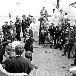 Northern Premier of A Hard Days Night'. Fans line up along the streets in Northern Premier of A Hard Days Night'. Fans line up along the streets in