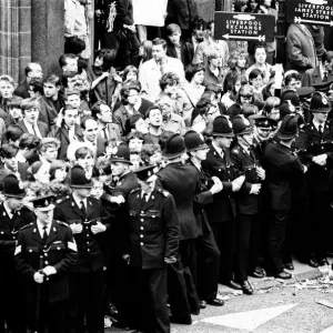 Northern Premier of A Hard Days Night'. Fans line up along the streets in Northern Premier of A Hard Days Night'. Fans line up along the streets in