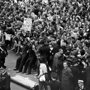 Northern Premier of A Hard Days Night'. Fans line up along the streets in Northern Premier of A Hard Days Night'. Fans line up along the streets in