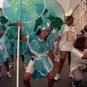 Notting Hill Carnival August 1997 Men, women and children dress up in costumes for