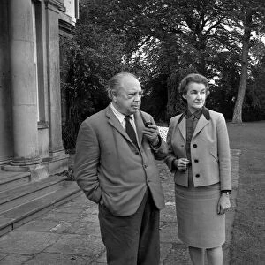 Novelist J. B. Priestley in the garden of his home with his wife Jacquetta Hawkes at