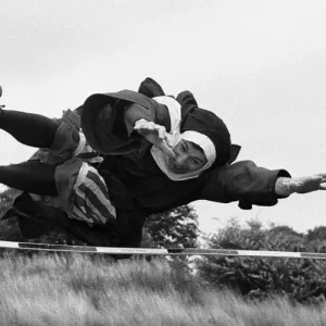 The Nuns Olympics. The nuns high jump, an attempt by David Cannon The Nuns Olympics. The nuns high jump, an attempt by David Cannon
