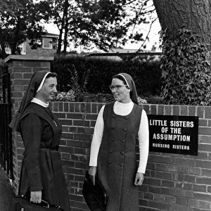 Nuns - Photo call for two short-skirted Little Sisters of the Assumption