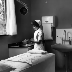 Nurse Phoebe Barrett, aged 22, in one of the consultant examination rooms at Birmingham Nurse Phoebe Barrett, aged 22, in one of the consultant examination rooms at Birmingham
