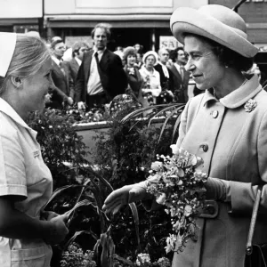 Nurse Susan Laskey presents a bouquet to Queen Elizabeth II as she arrives at Stockton Nurse Susan Laskey presents a bouquet to Queen Elizabeth II as she arrives at Stockton
