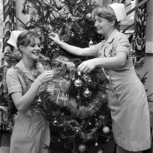 Nurses Decorate a Christmas Tree Print 1980