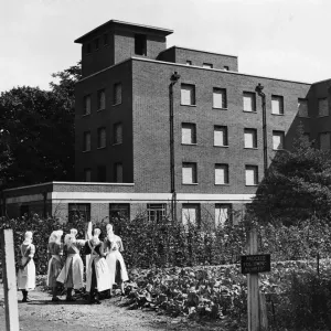 Print of Nurses outside Queen Charlotte's Hospital, London