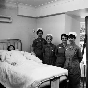 Nurses training with their dummy patient. This is for the future hospital which will be Nurses training with their dummy patient. This is for the future hospital which will be