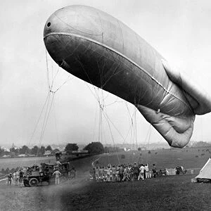 Observation balloon seen here being inflated at Epsom race course by members of