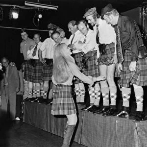 Off with their trousers! A line-up of phoney Scots in the Caledonian Suite night club