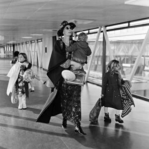 Off on a weeks holiday to Rome is Vanessa Redgrave with children Natasha, 7, Joely