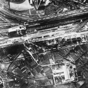 This official photo of Naples shows damage inflicted in recent R. A. F. bombing attacks This official photo of Naples shows damage inflicted in recent R. A. F. bombing attacks