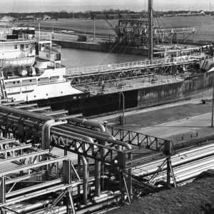 An oil tanker discharges oil at the quayside of the Queen Elizabeth II oil dock An oil tanker discharges oil at the quayside of the Queen Elizabeth II oil dock