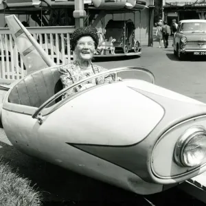 Old age pensioner Ellen Pert 101 years old rides in a fairground dive-bomber car ride Old age pensioner Ellen Pert 101 years old rides in a fairground dive-bomber car ride