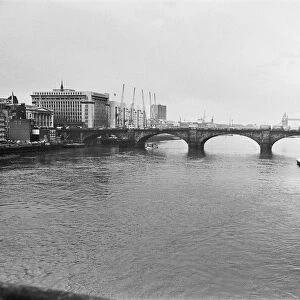 Old London Bridge, across The River Thames, London. Picture is looking down river