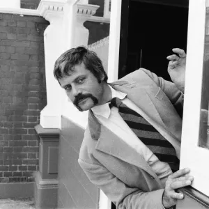 Oliver Reed, British actor, enjoys a few drinks at his local pub, The Dog and Fox Oliver Reed, British actor, enjoys a few drinks at his local pub, The Dog and Fox