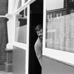 Oliver Reed, British actor, enjoys a few drinks at his local pub, The Dog and Fox Oliver Reed, British actor, enjoys a few drinks at his local pub, The Dog and Fox