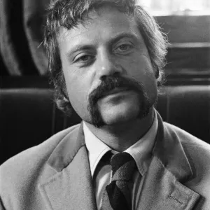Oliver Reed, British actor, enjoys a few drinks at his local pub, The Dog and Fox Oliver Reed, British actor, enjoys a few drinks at his local pub, The Dog and Fox