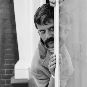 Oliver Reed, British actor, enjoys a few drinks at his local pub, The Dog and Fox Oliver Reed, British actor, enjoys a few drinks at his local pub, The Dog and Fox