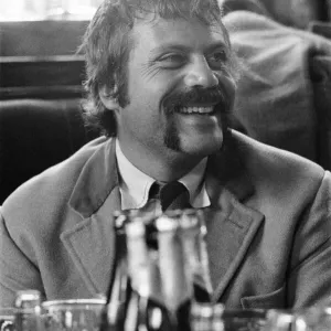 Oliver Reed, British actor, enjoys a few drinks at his local pub, The Dog and Fox Oliver Reed, British actor, enjoys a few drinks at his local pub, The Dog and Fox