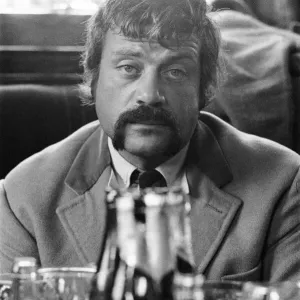 Oliver Reed, British actor, enjoys a few drinks at his local pub, The Dog and Fox Oliver Reed, British actor, enjoys a few drinks at his local pub, The Dog and Fox