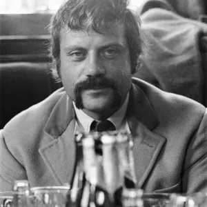 Oliver Reed, British actor, enjoys a few drinks at his local pub, The Dog and Fox Oliver Reed, British actor, enjoys a few drinks at his local pub, The Dog and Fox