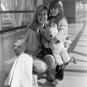 Olivia Newton John Print at Heathrow Airport with Nephew Olivia Newton John Print at Heathrow Airport with Nephew
