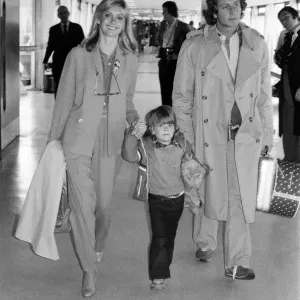 Olivia Newton John departing Heathrow Airport with her nephew Emerson