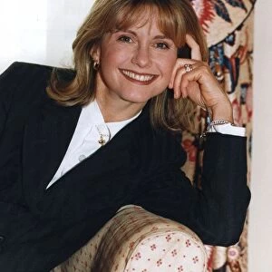 Olivia Newton-John smiling during interview in London hotel - January 1995