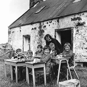 Open air lessons at Scoraig with teacher Celia Ertz outside the tiny schoolhouse. 1967