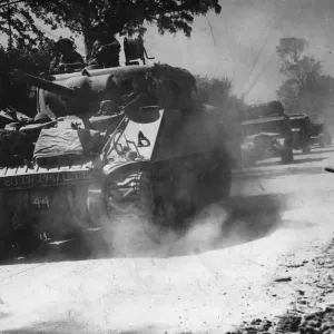 Print of British tanks moving south near Aunay in August 1944
